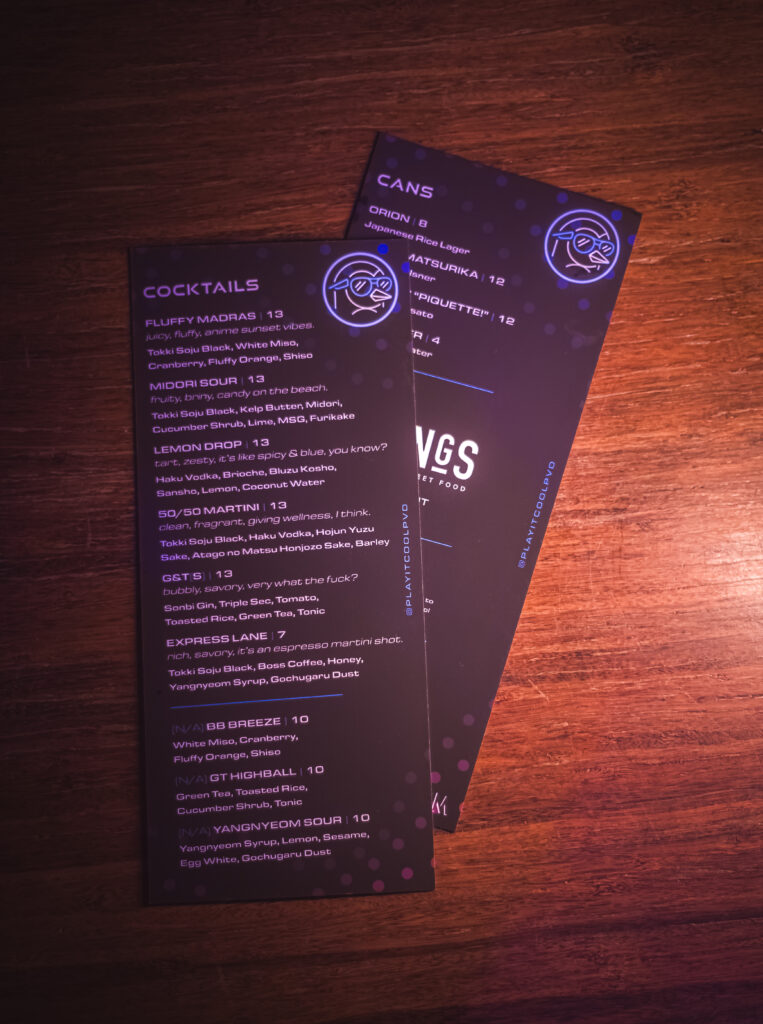 Play It Cool Pop-Up Bar Menu featuring cocktails and cans, including Fluffy Madras, Midori Sour, and Orion. @playitcoolpvd.