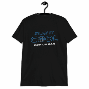"Play It Cool Pop-Up Bar" logo T-shirt in black, featuring blue and white text design with a stylized icon.